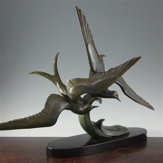 Irénée Rochard (1906-1984). An Art Deco bronze group of terns flying above a wave, W.32in. H.23.5in.